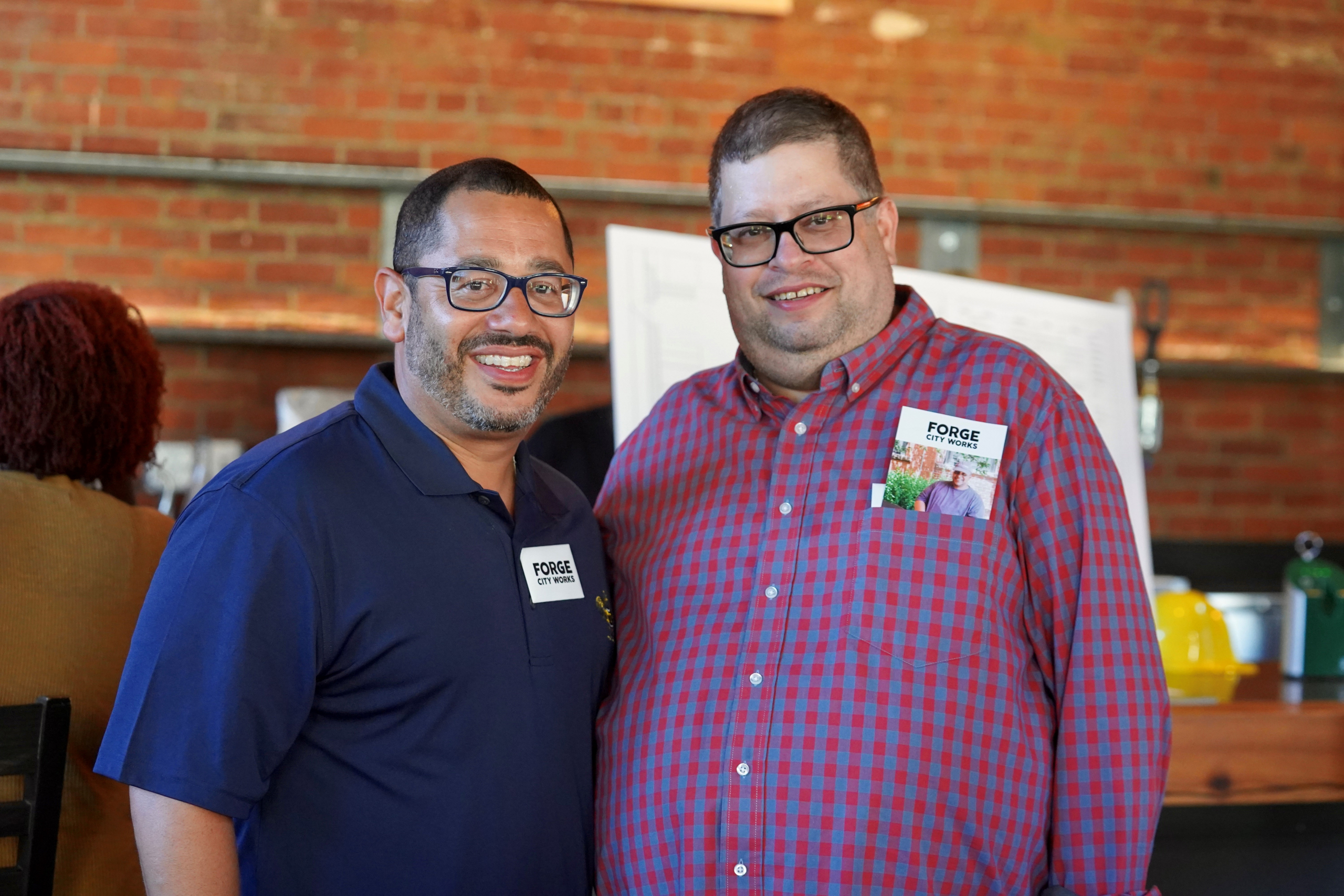 Jason Rojas and Ben Dubow, Forge City Works executive director. Photo by Molly Shanahan, Watermark Inc.